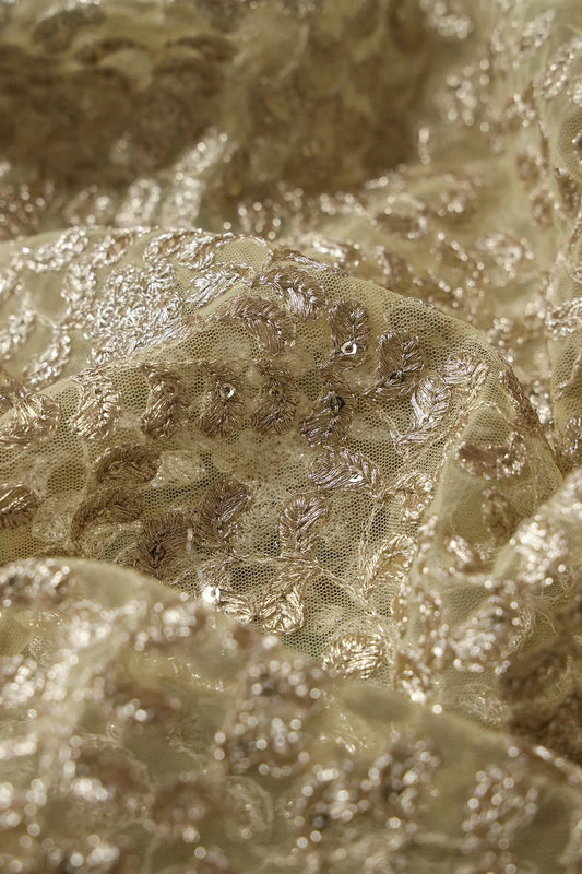 AIzaSyBcstauz-XMPRhEY21AUzeo032pxrXB5Ug - Gold Zari With Gold Sequins Leafy Heavy Embroidery Work On Pastel Yellow Soft Net Fabric