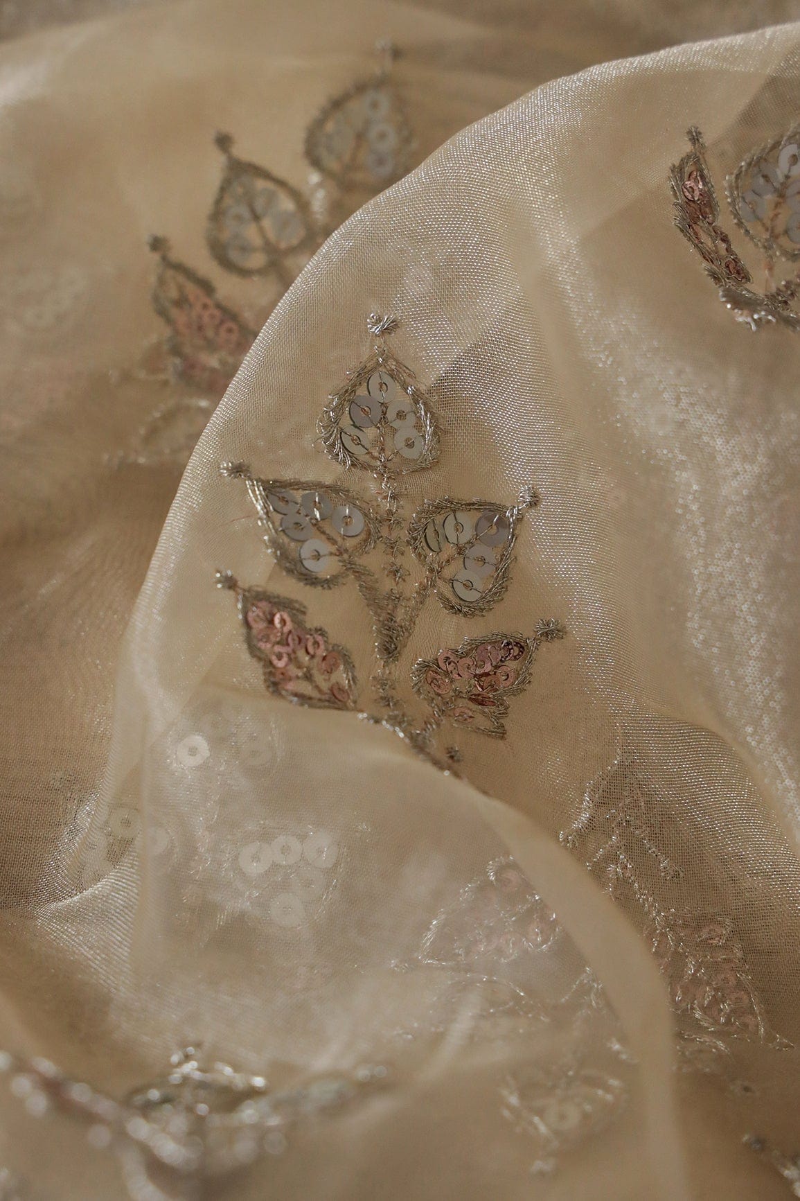 AIzaSyBcstauz-XMPRhEY21AUzeo032pxrXB5Ug - Gold Zari With Sequins Beautiful Leafy Embroidery Work On Beige Tissue Fabric