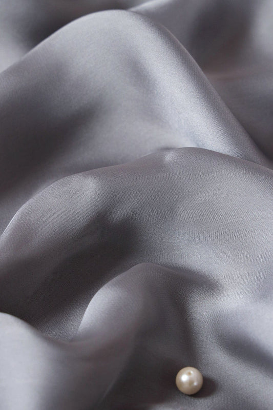 AIzaSyBcstauz-XMPRhEY21AUzeo032pxrXB5Ug - Grey Dyed Georgette Satin Fabric
