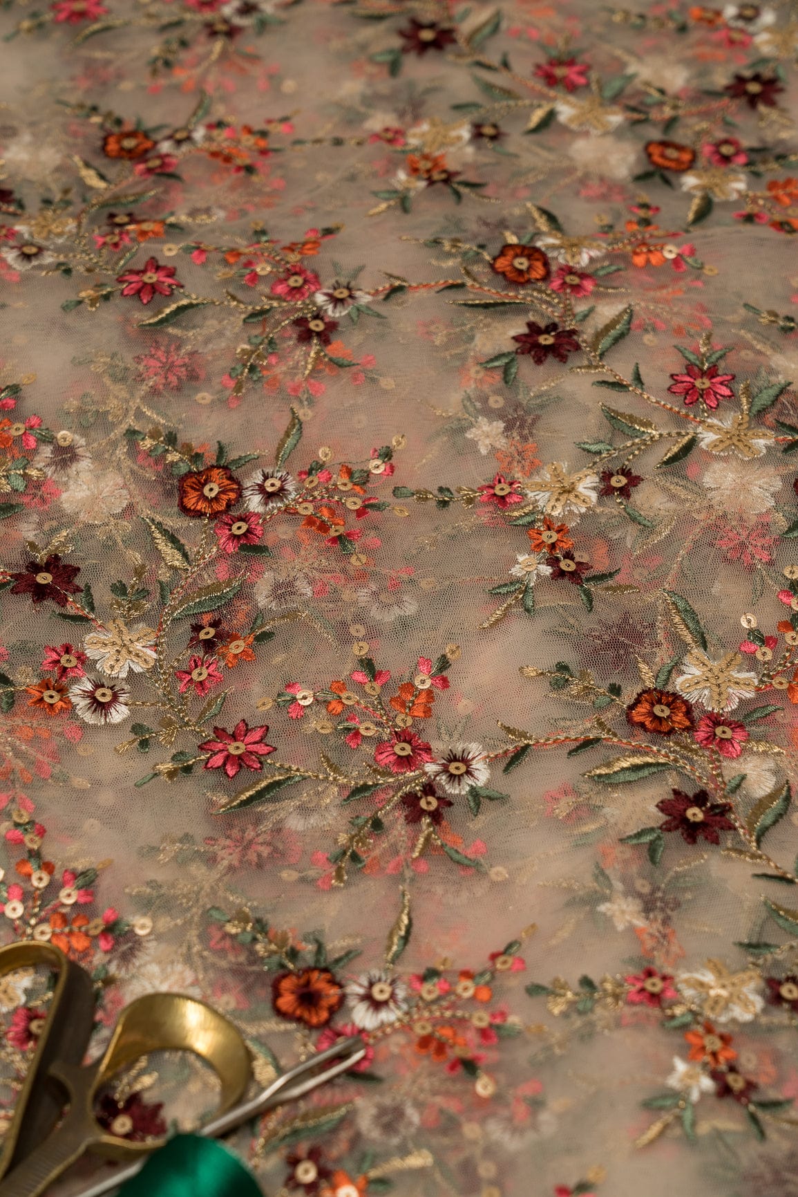 AIzaSyBcstauz-XMPRhEY21AUzeo032pxrXB5Ug - Heavy Multi Coloured Thread Embroidery On Peach Soft Net