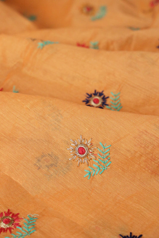 Multi Color Sun Flower Zari Embroidery On Peach Chanderi Fabric