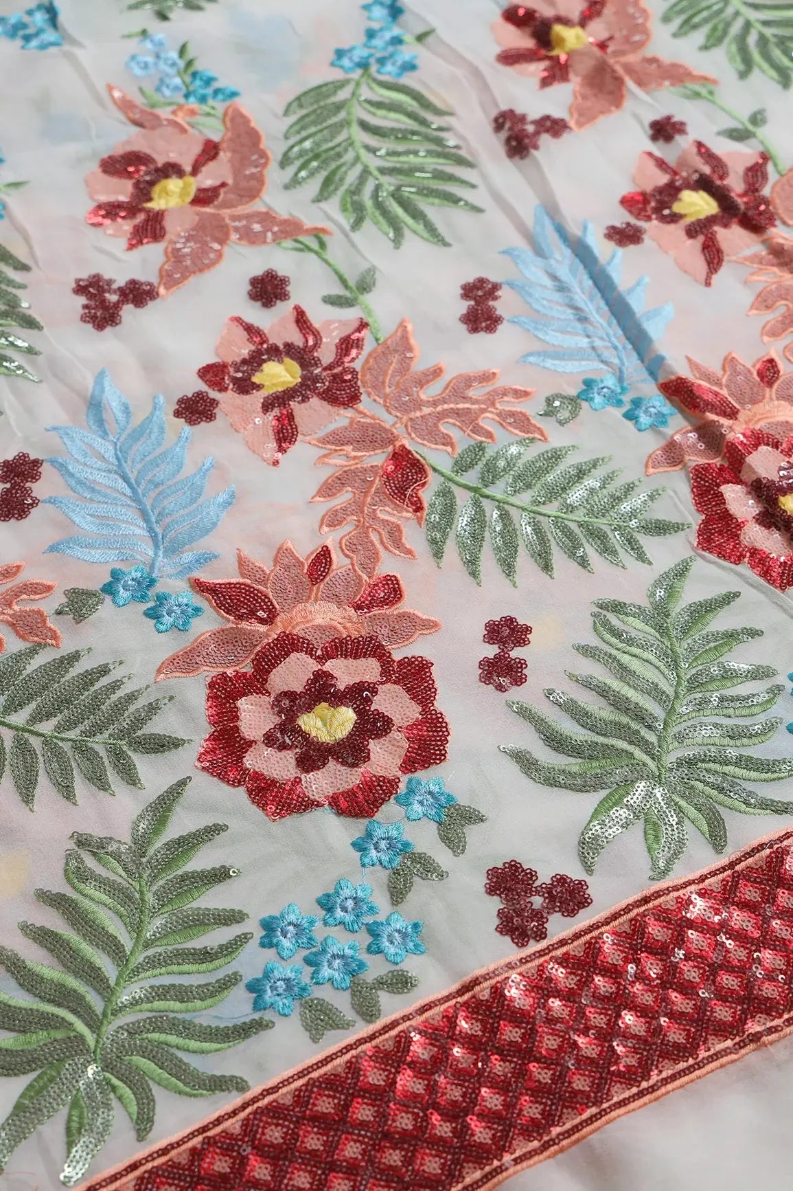 AIzaSyBcstauz-XMPRhEY21AUzeo032pxrXB5Ug - Big Width 56 Multi Sequins With Multi Thread Floral Embroidery On Dyeable White Viscose Georgette Fabric With Border