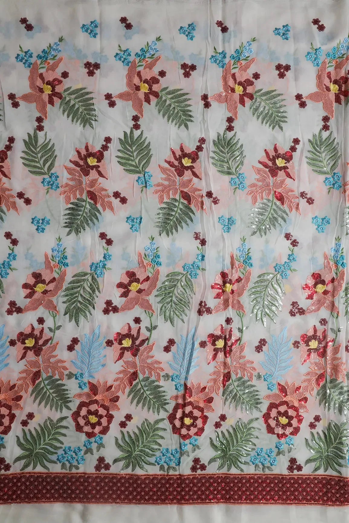 AIzaSyBcstauz-XMPRhEY21AUzeo032pxrXB5Ug - Big Width 56 Multi Sequins With Multi Thread Floral Embroidery On Dyeable White Viscose Georgette Fabric With Border