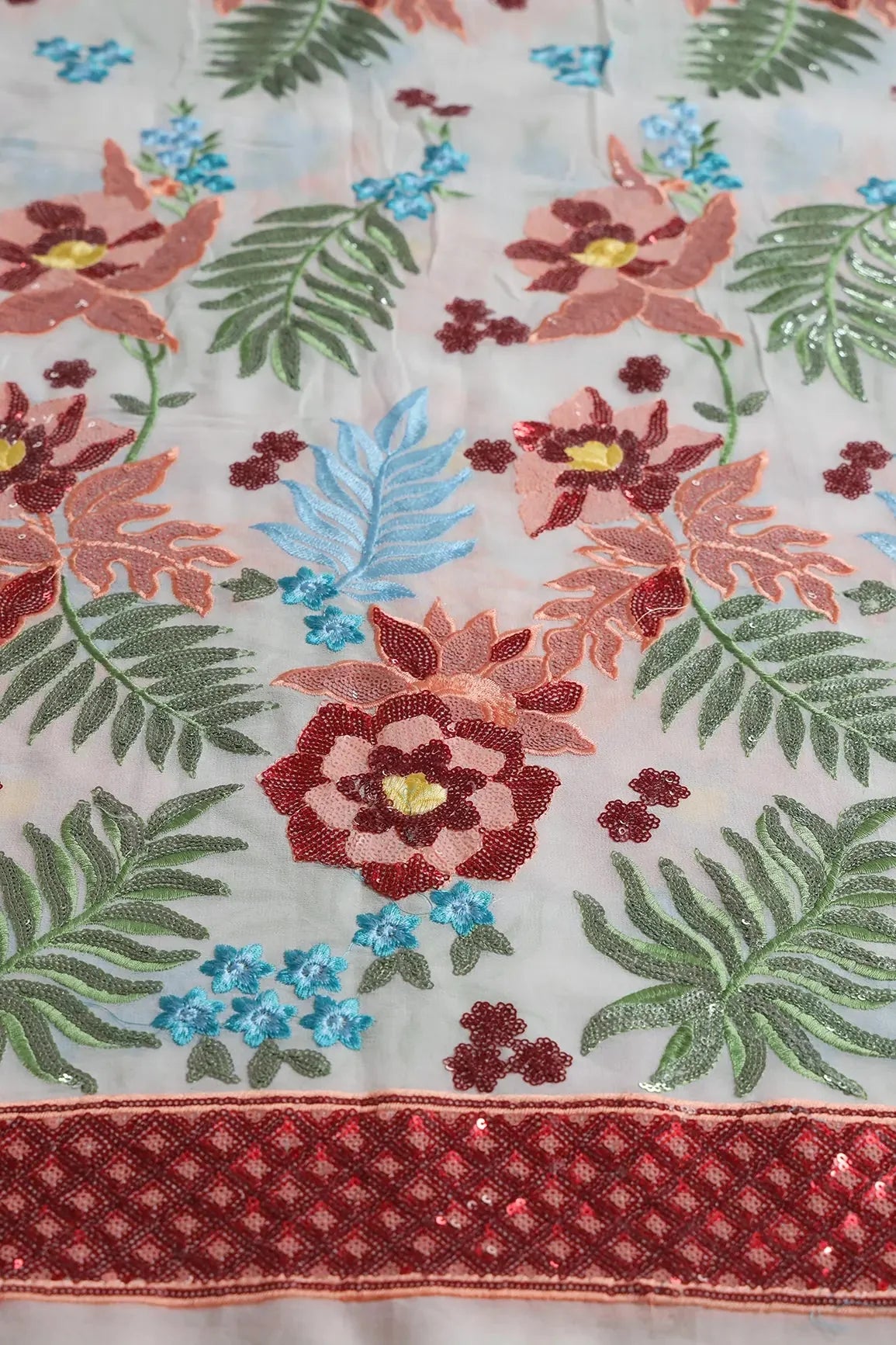 AIzaSyBcstauz-XMPRhEY21AUzeo032pxrXB5Ug - Big Width 56 Multi Sequins With Multi Thread Floral Embroidery On Dyeable White Viscose Georgette Fabric With Border