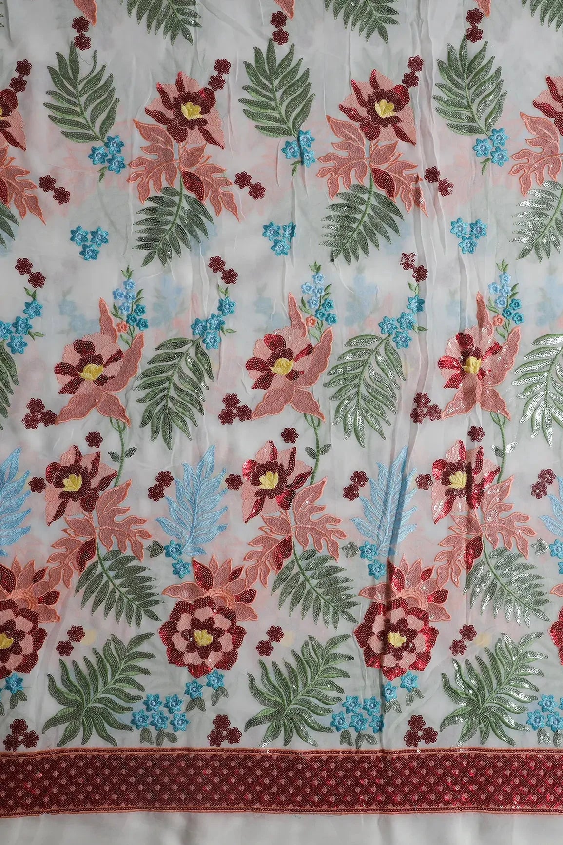 AIzaSyBcstauz-XMPRhEY21AUzeo032pxrXB5Ug - Big Width 56 Multi Sequins With Multi Thread Floral Embroidery On Dyeable White Viscose Georgette Fabric With Border