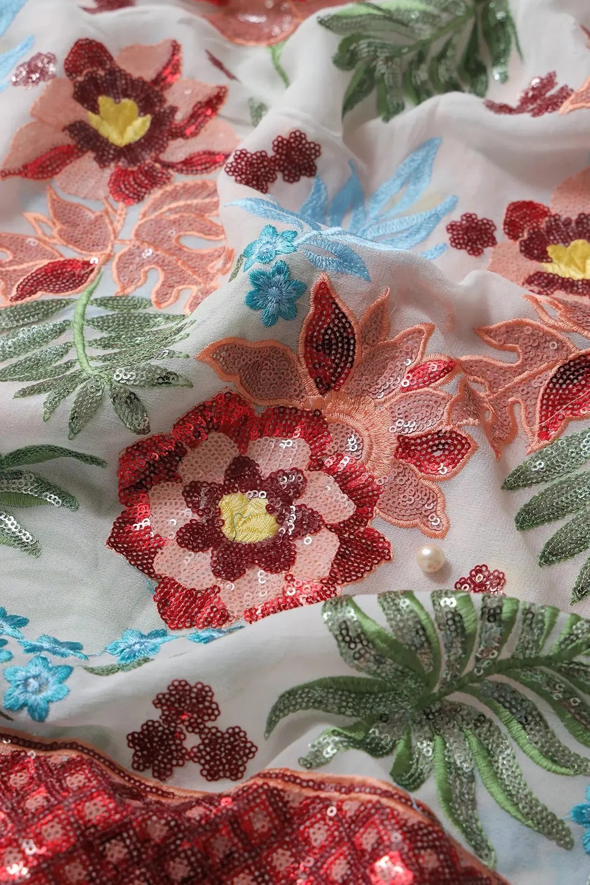 AIzaSyBcstauz-XMPRhEY21AUzeo032pxrXB5Ug - Big Width 56 Multi Sequins With Multi Thread Floral Embroidery On Dyeable White Viscose Georgette Fabric With Border