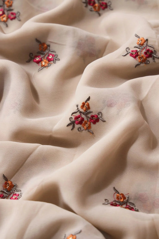 Orange And Dark Pink Thread With Sequins Floral Embroidery Work On Beige Georgette Fabric