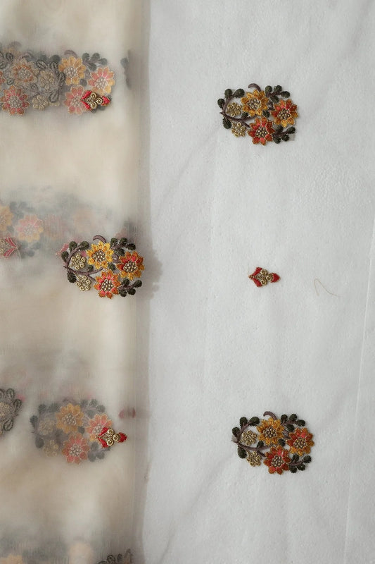 Orange And Mustard Thread With Gold Zari Floral Embroidery On Cream Soft Net Fabric