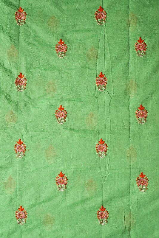 Orange And Pink Thread With Gold Zari Floral Embroidery On Green Chanderi Fabric