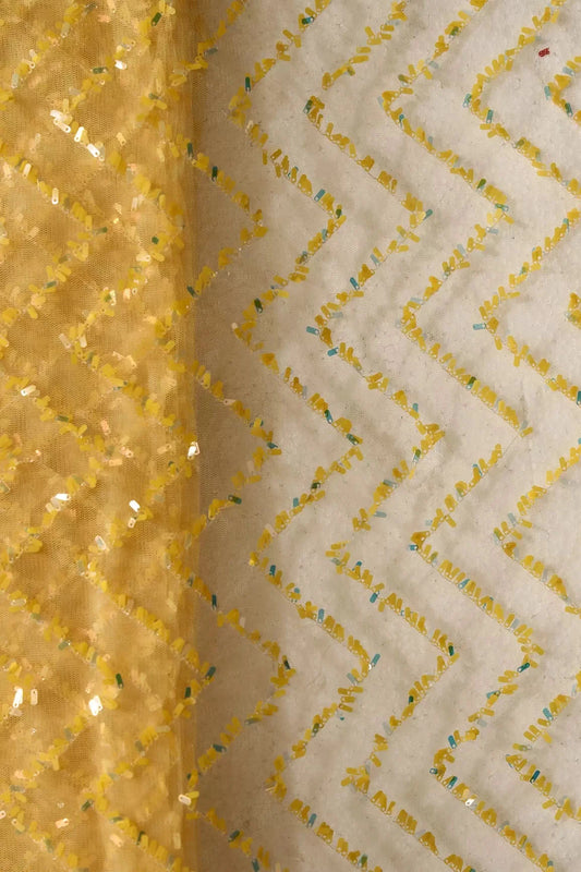 Oval Sequins Chevron Embroidery Work On Yellow Soft Net Fabric