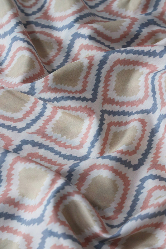 Pastel Peach And Olive Ikat Pattern Digital Print On French Crepe Fabric