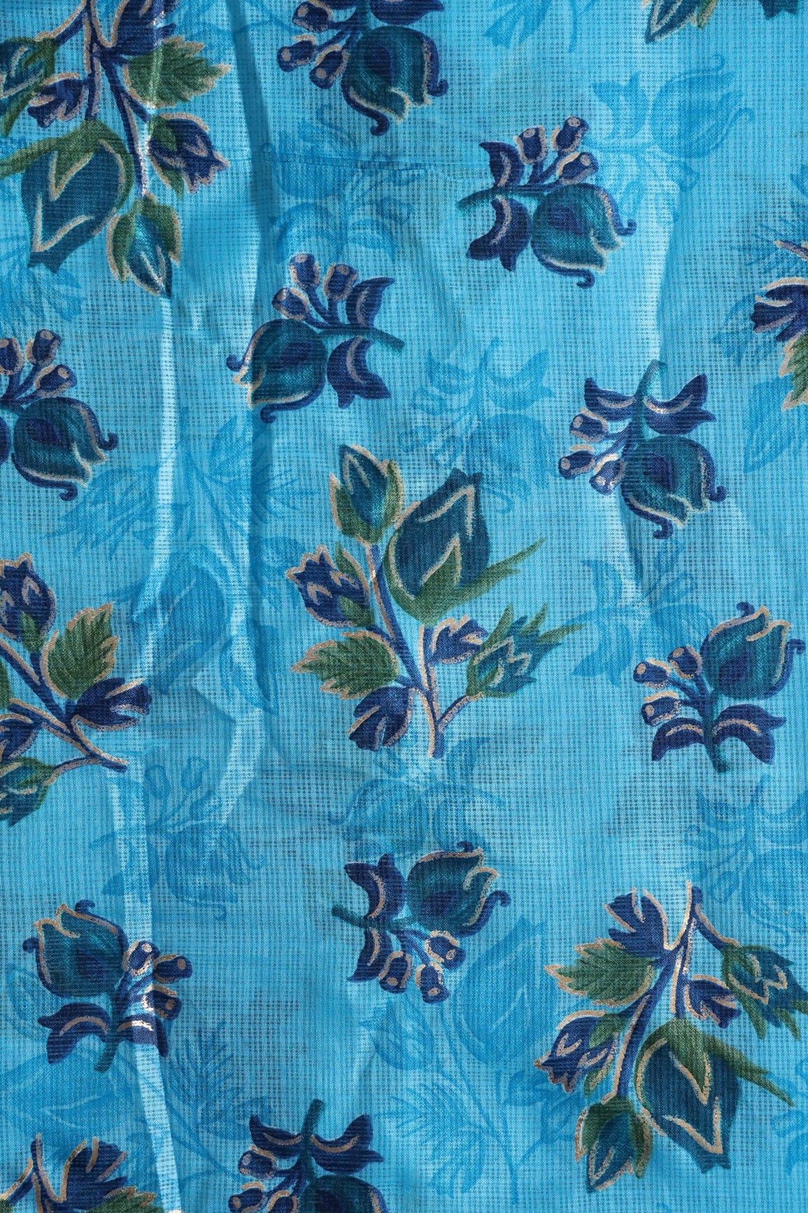 AIzaSyBcstauz-XMPRhEY21AUzeo032pxrXB5Ug - Blue And Green Floral Pattern Foil Print On Sky Blue Kota Doria Fabric