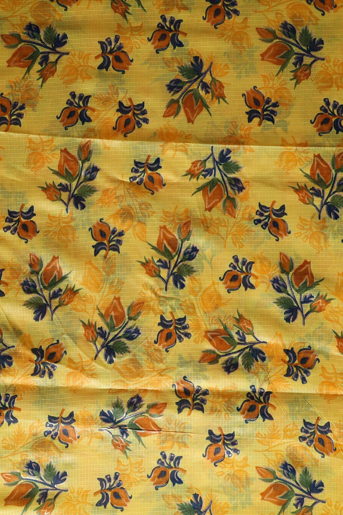 AIzaSyBcstauz-XMPRhEY21AUzeo032pxrXB5Ug - Brown And Green Floral Pattern Foil Print On Yellow Kota Doria Fabric