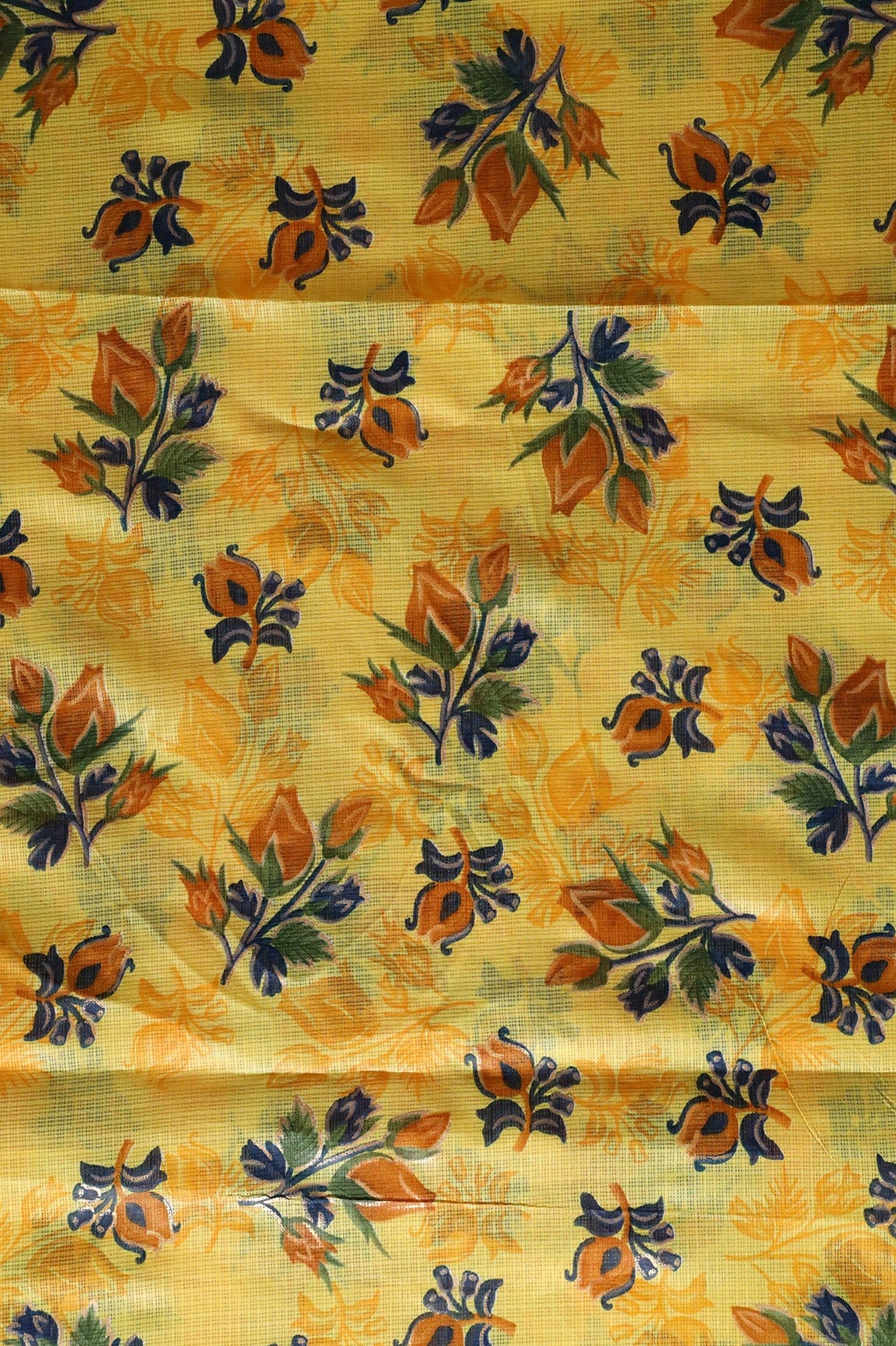 AIzaSyBcstauz-XMPRhEY21AUzeo032pxrXB5Ug - Brown And Green Floral Pattern Foil Print On Yellow Kota Doria Fabric
