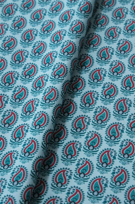 Red And Green Paisley Pattern Digital Print On Light Blue French Crepe Fabric