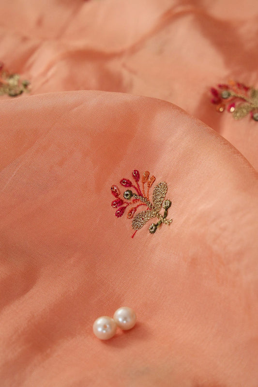 Sequins and Zari Work with Floral Embroidery On Peach Uppada Silk Fabric