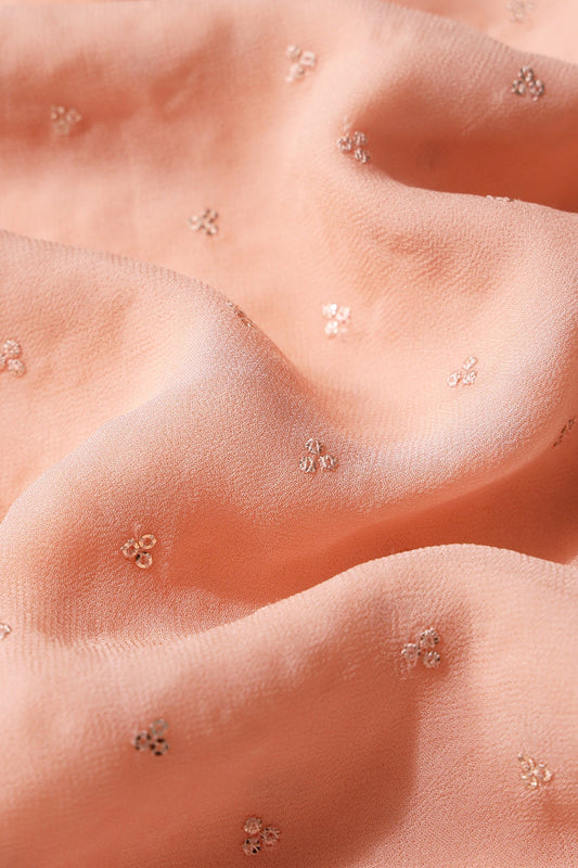 Small Motif Sequins Embroidery On Peach Viscose Georgette Fabric