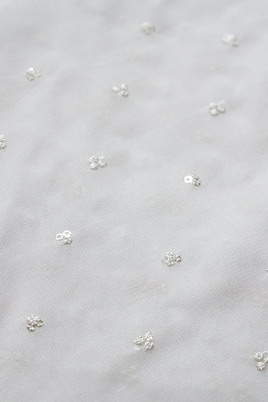 Small Motif Sequins Embroidery On White Dyeable Viscose Georgette Fabric