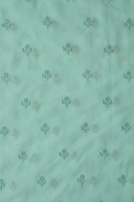 Turquoise Thread With Sequins Small Floral Embroidery Work On Pale Turquoise Georgette Fabric