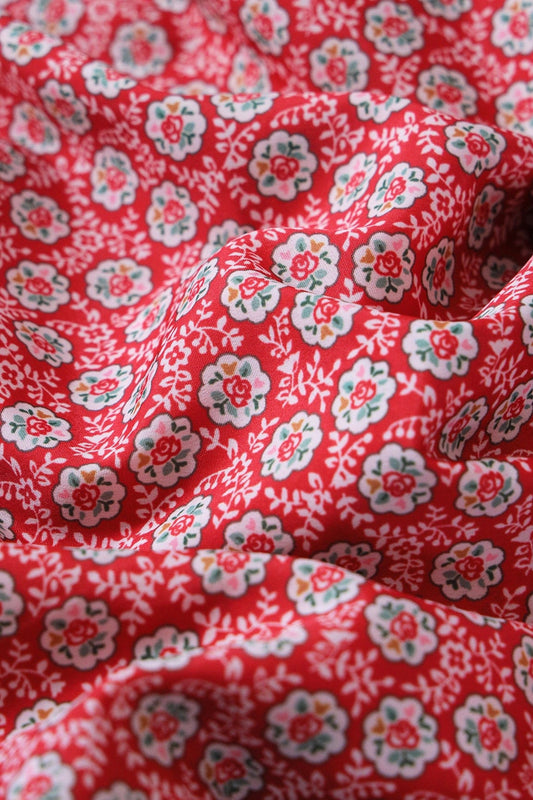 White Small Floral Pattern Digital Print On Red French Crepe Fabric