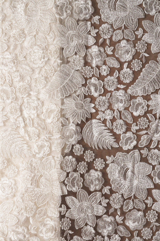 White Thread With Sequins Heavy Floral Embroidery On White Dyeable Soft Net Fabric