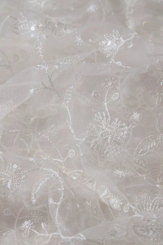 White Thread With Water Sequins Floral Embroidery On Dyeable White Soft Net Fabric